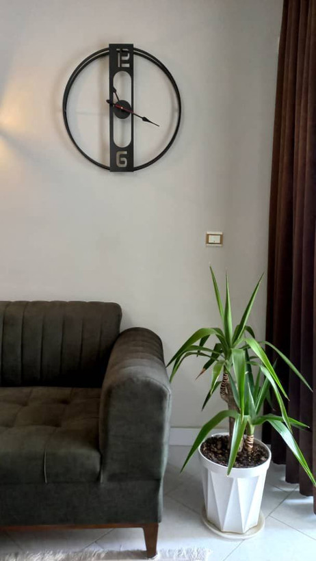 ساعت دیواری مدرن کد H/199 دارای موتور آرام گرد